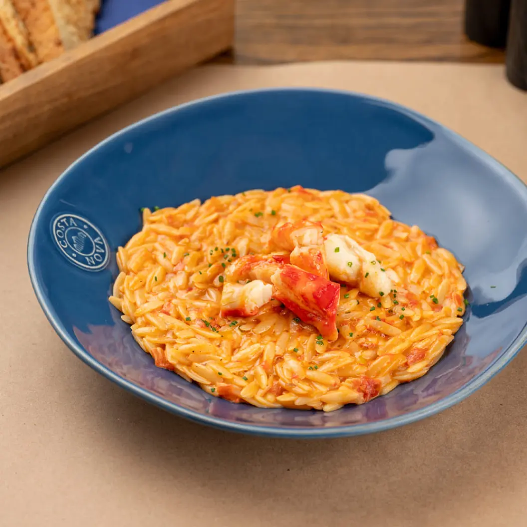 Ресторан Вино и Мясо: Орзо с томатами пронто и коленом краба